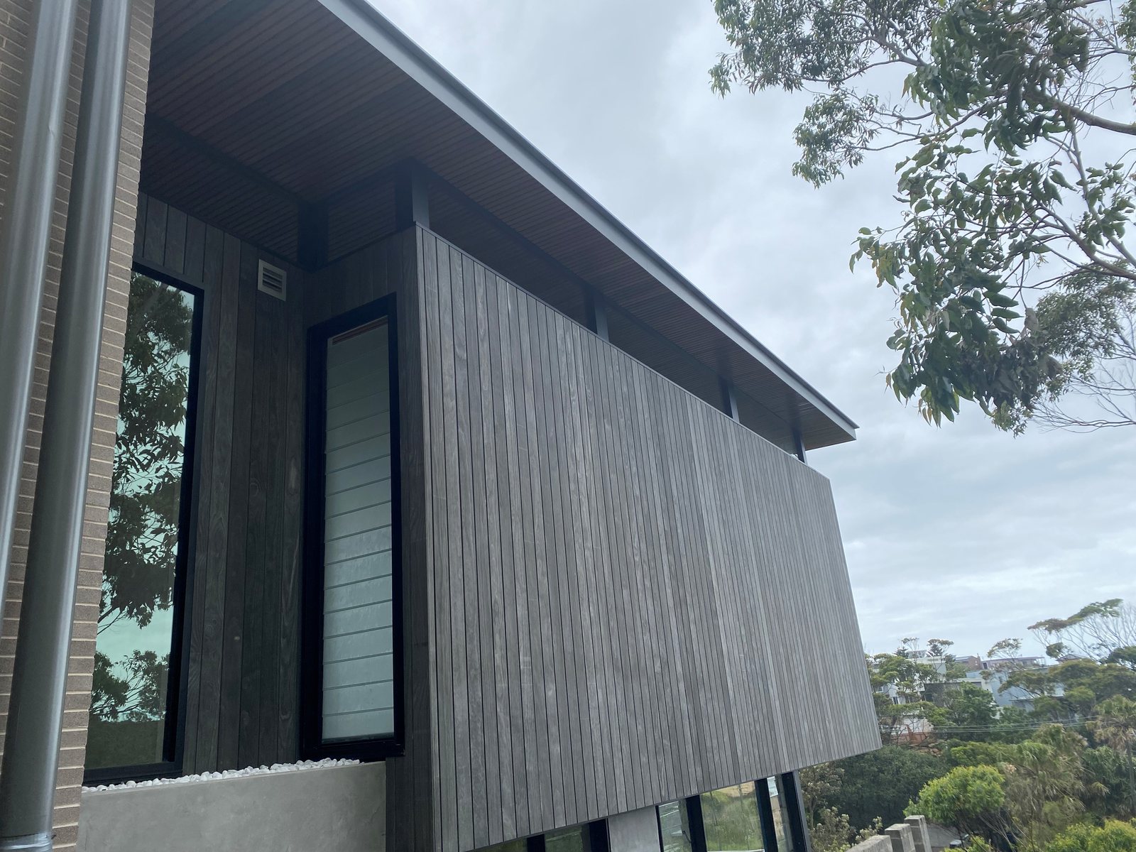 Accoya cladding in a weathered grey tone