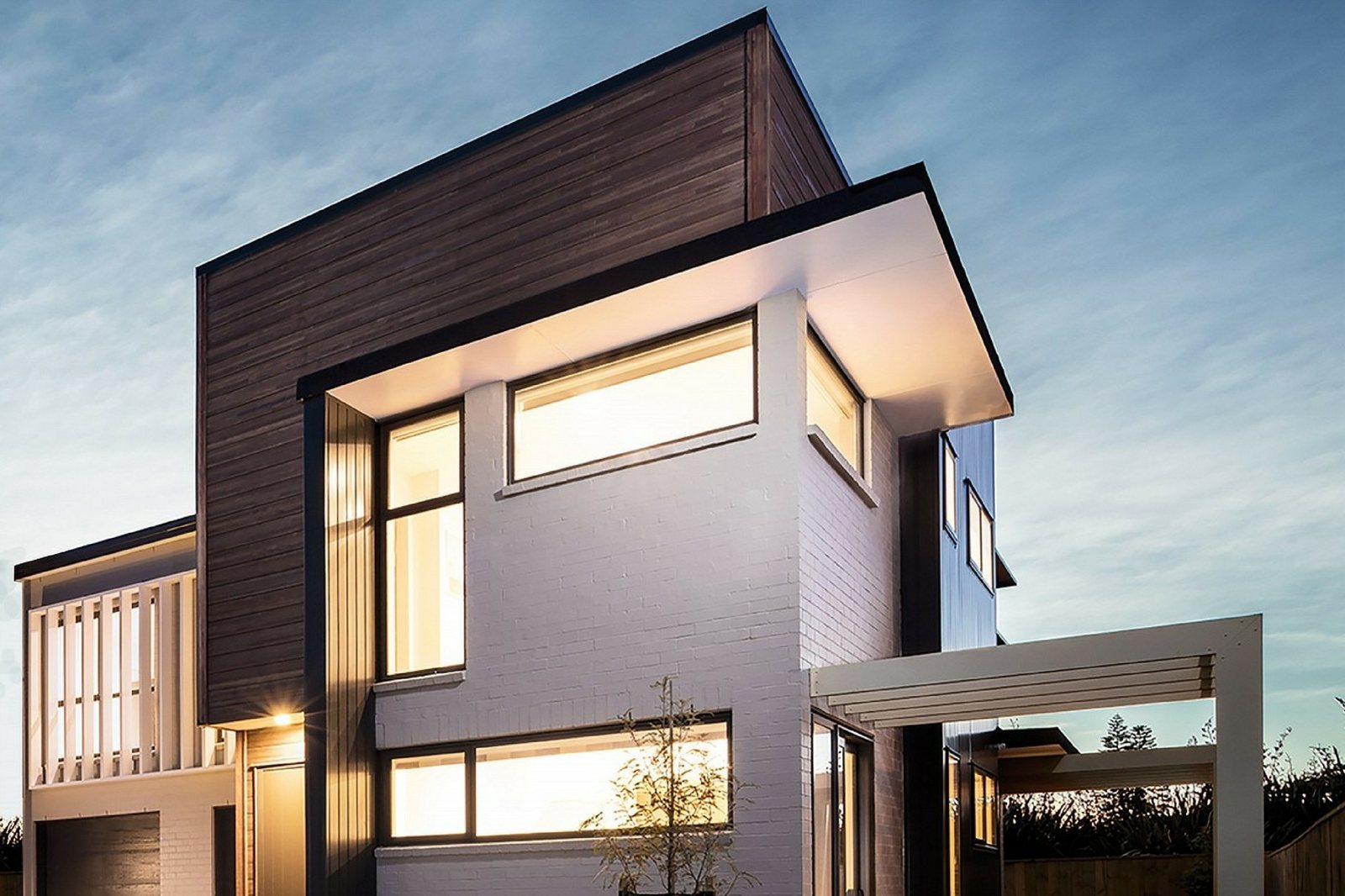 Modified cladding in a walnut tone on a finished wall
