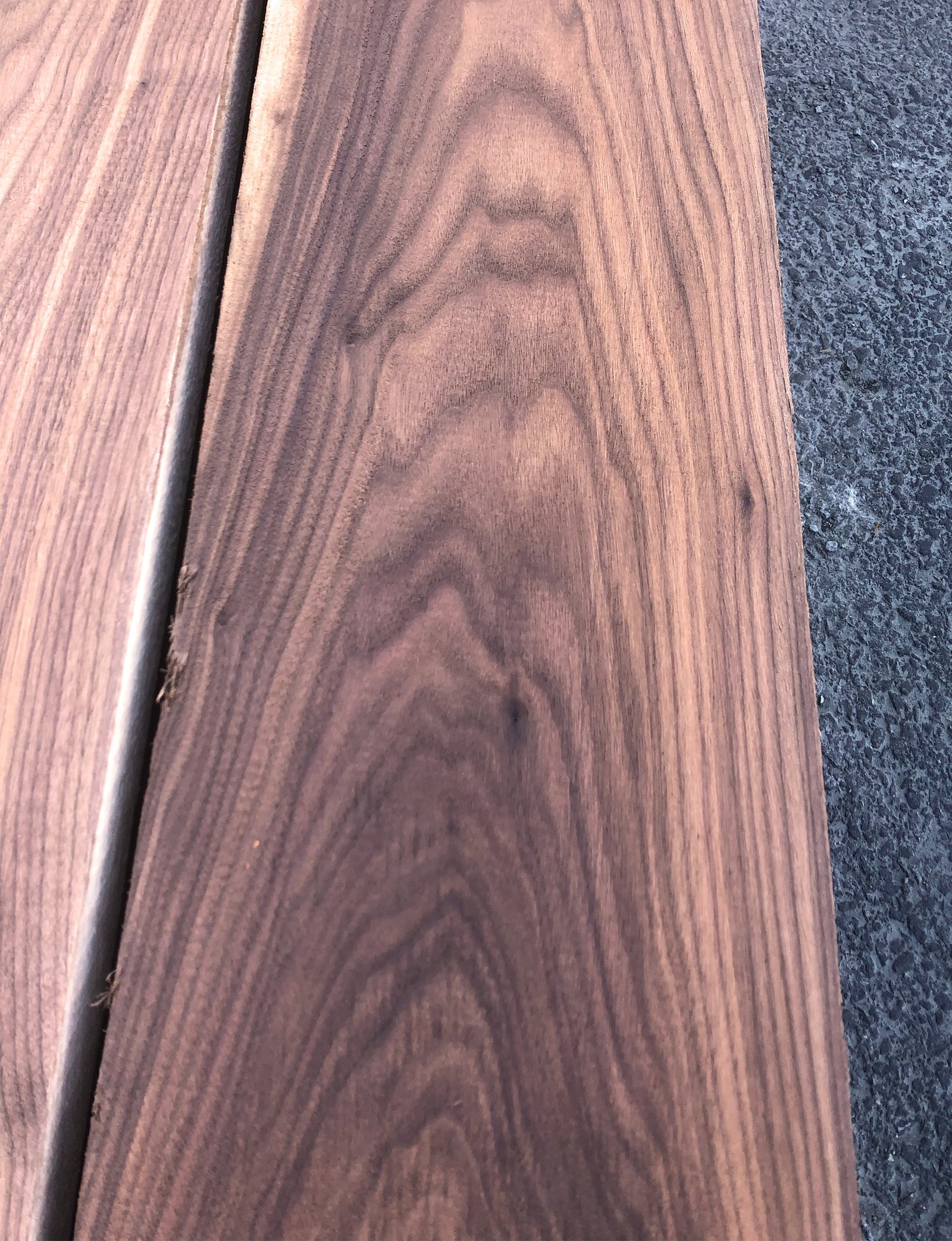Two walnut boards opened from the same flitch