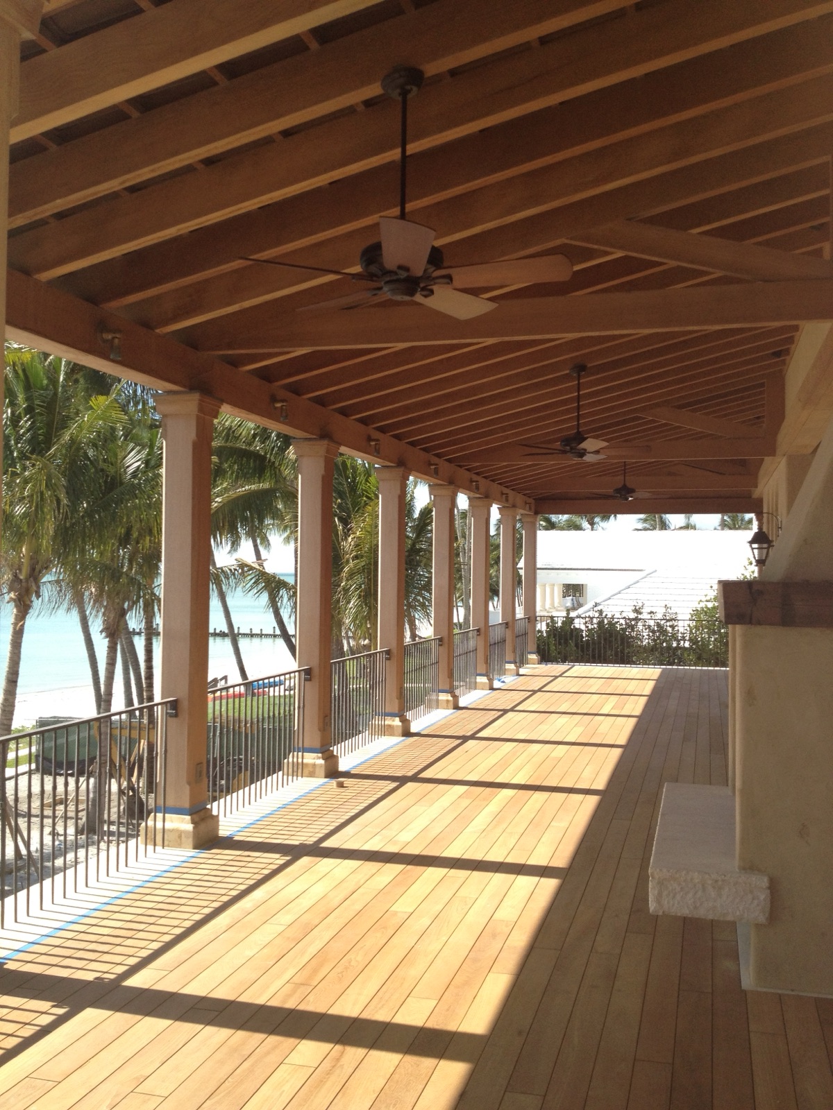 Covered tropical hardwood porch deck