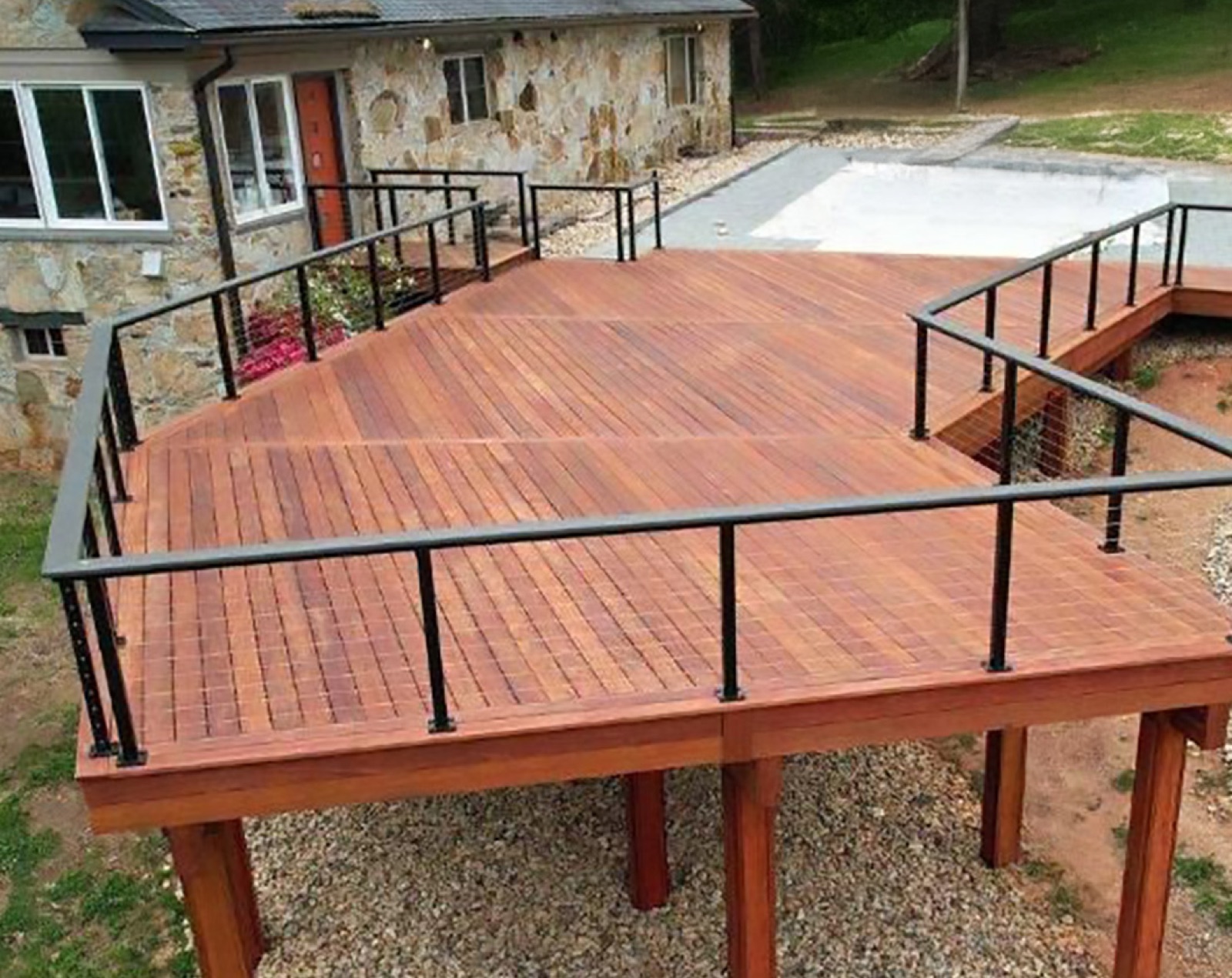 Tropical hardwood deck laid across a high traffic outdoor living area