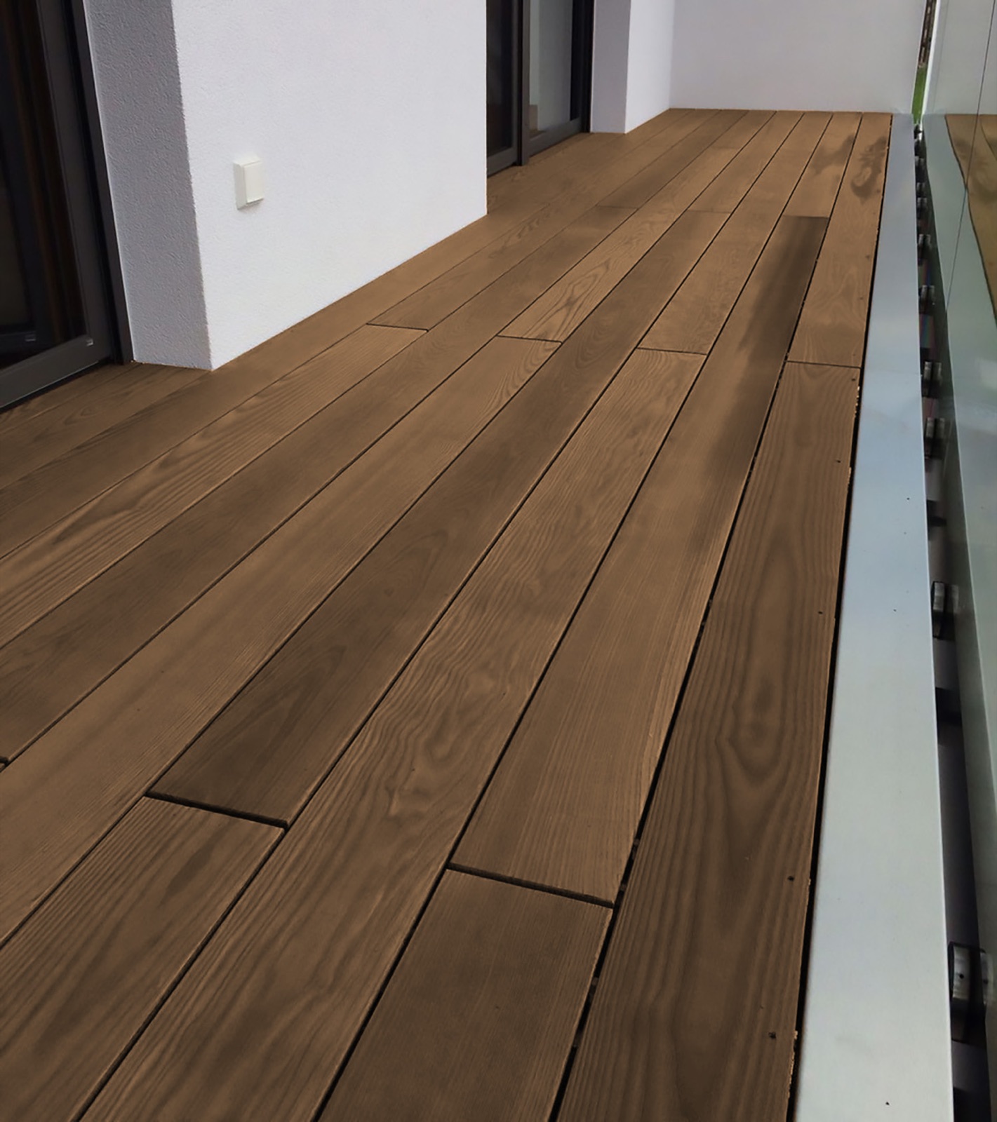 Tropical hardwood porch floor in a sheltered wear zone