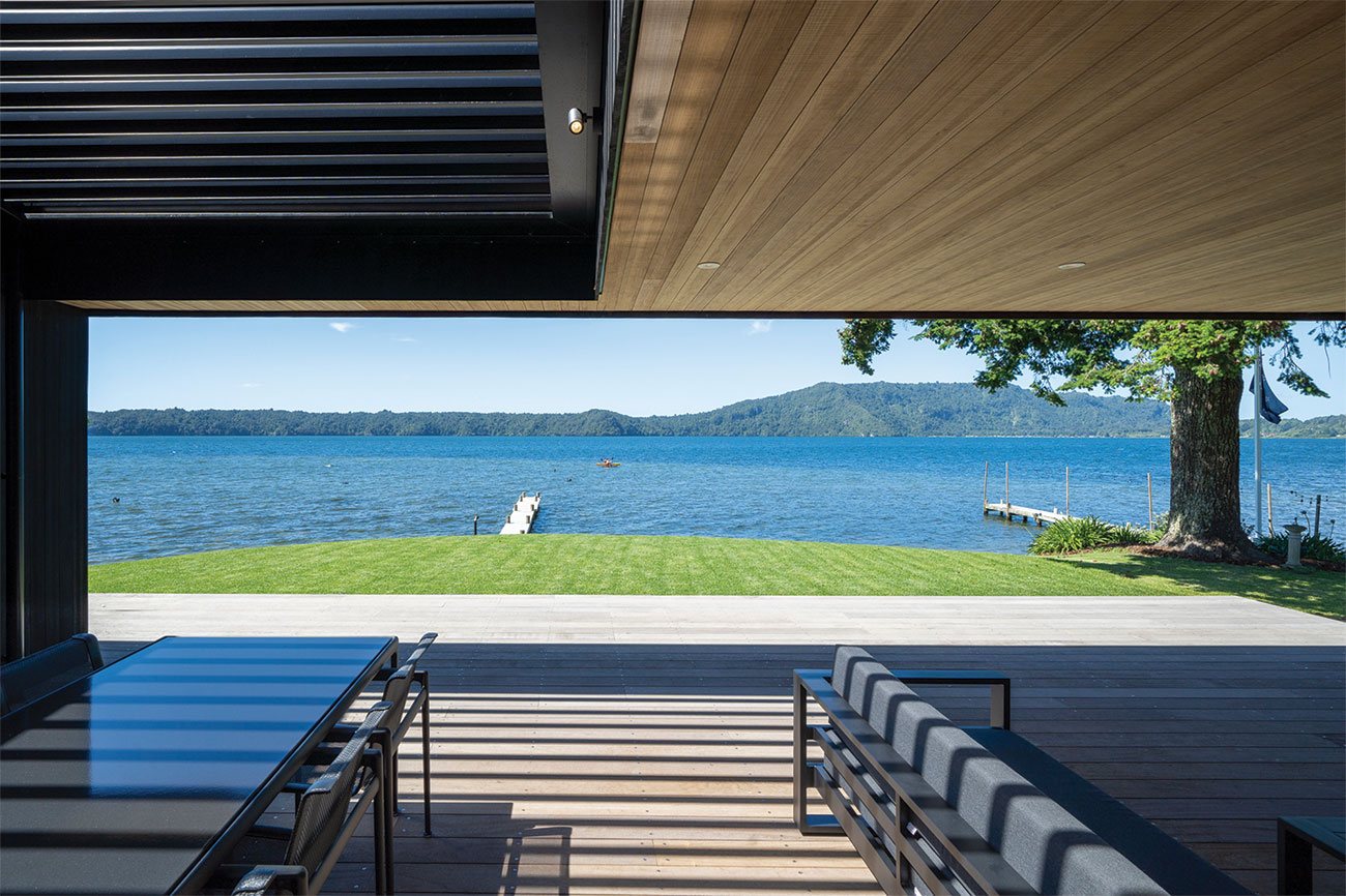Modified ceiling boards carried across a lakefront room