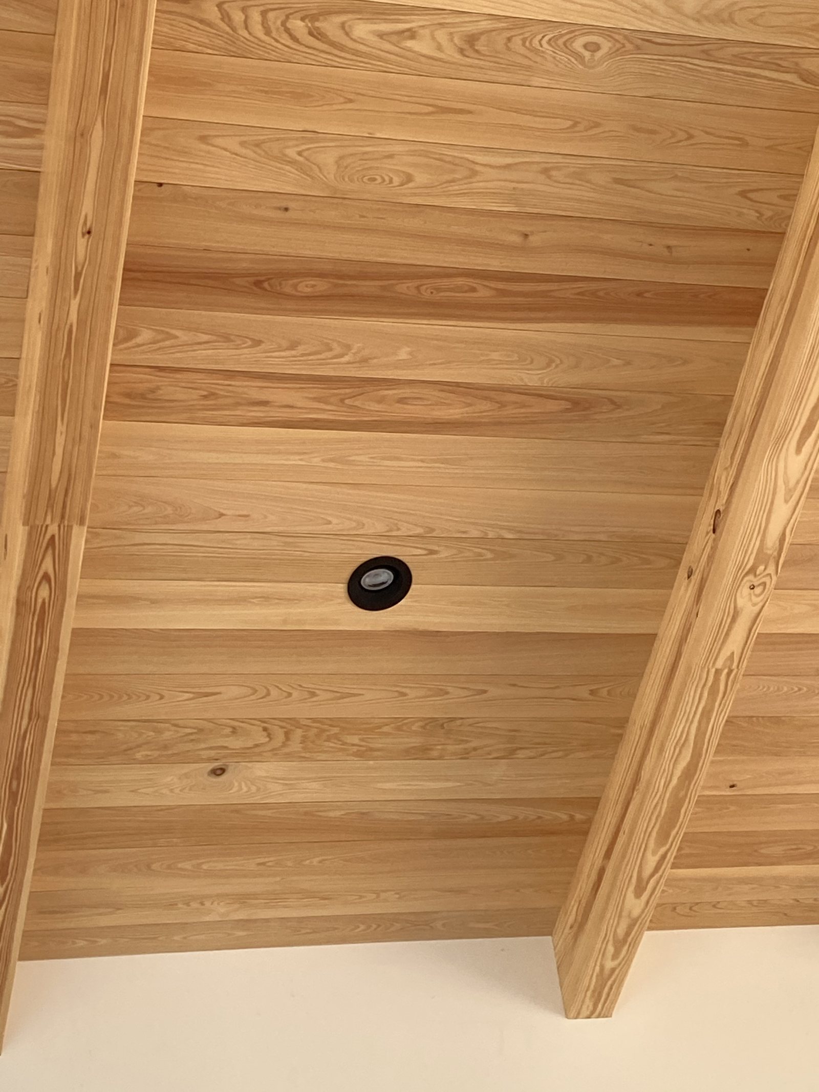 Cypress beam and ceiling assembly seen from below