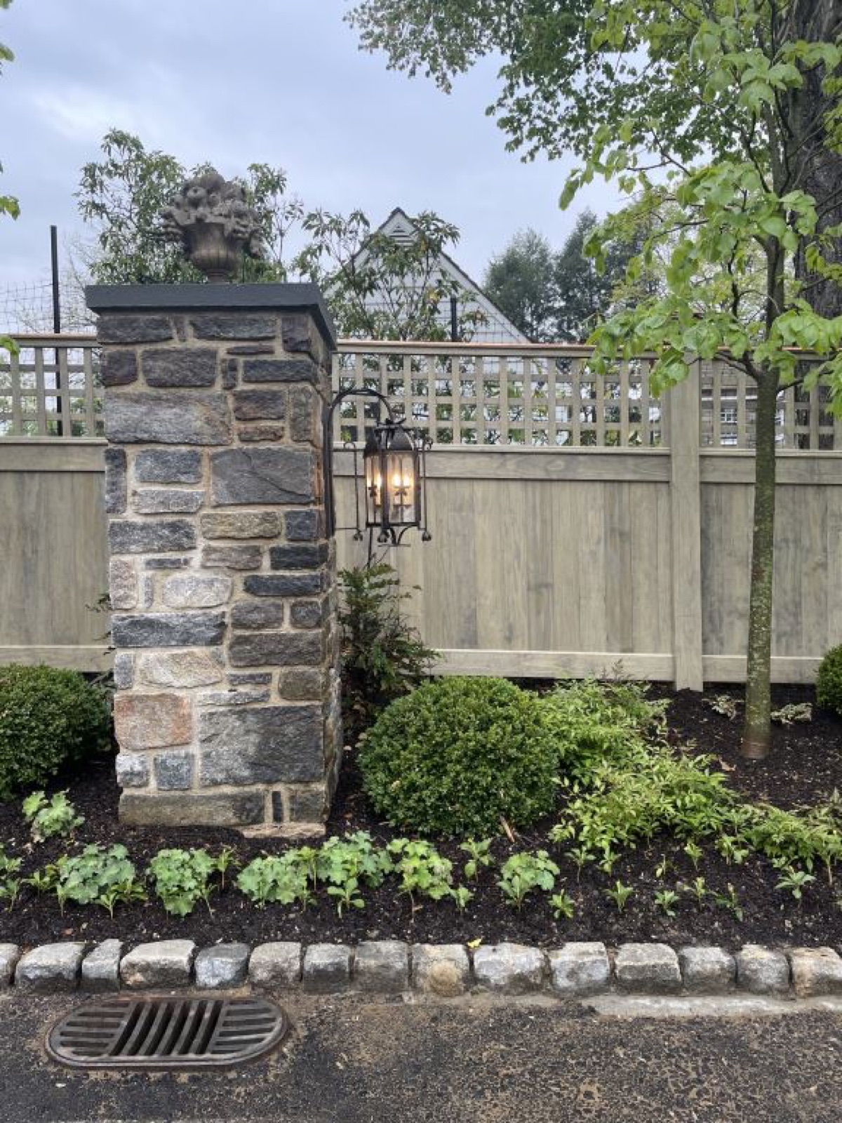 Modified wood fence on a finished exterior