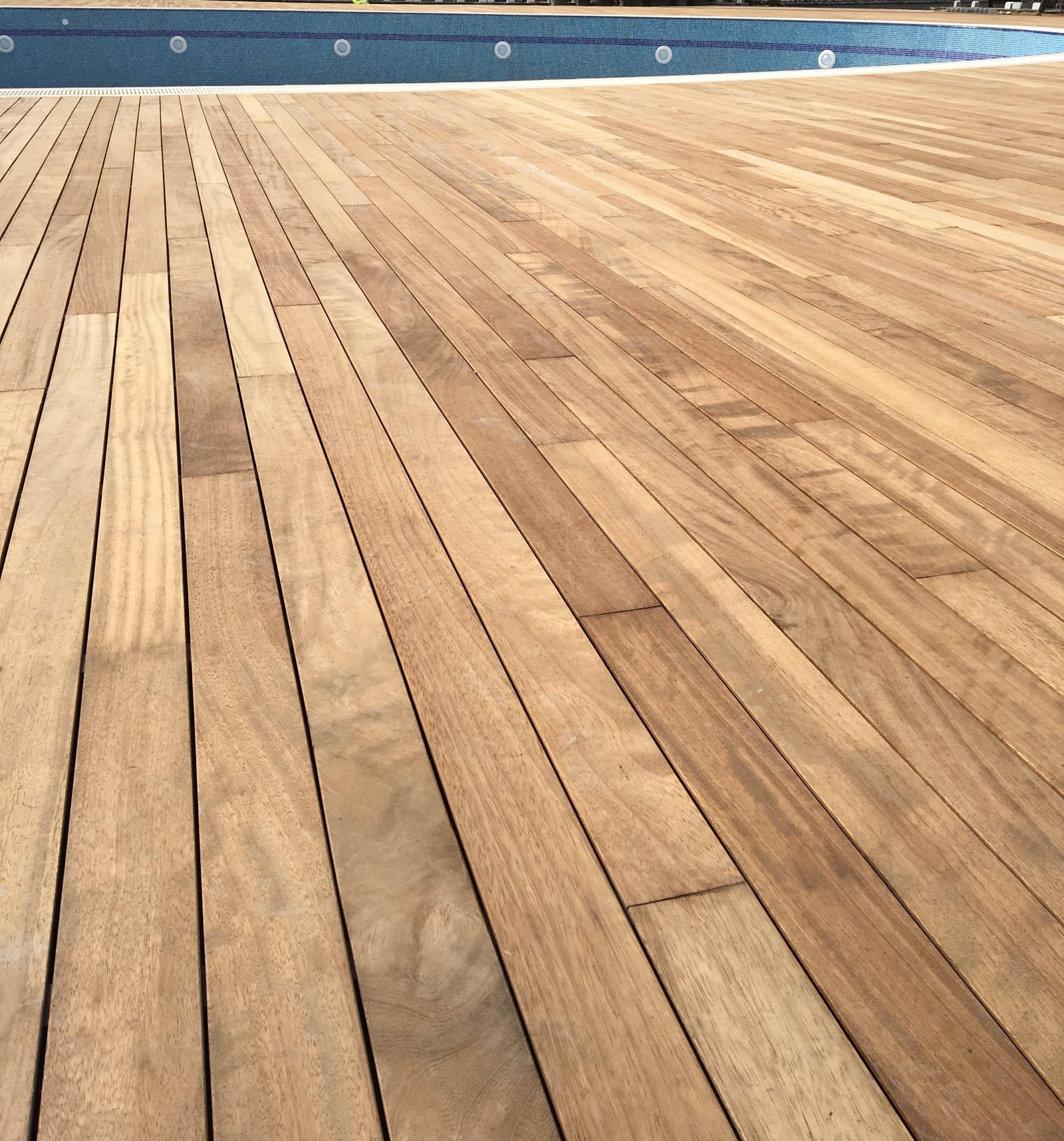 Modified decking boards seen close, showing the gaps between them