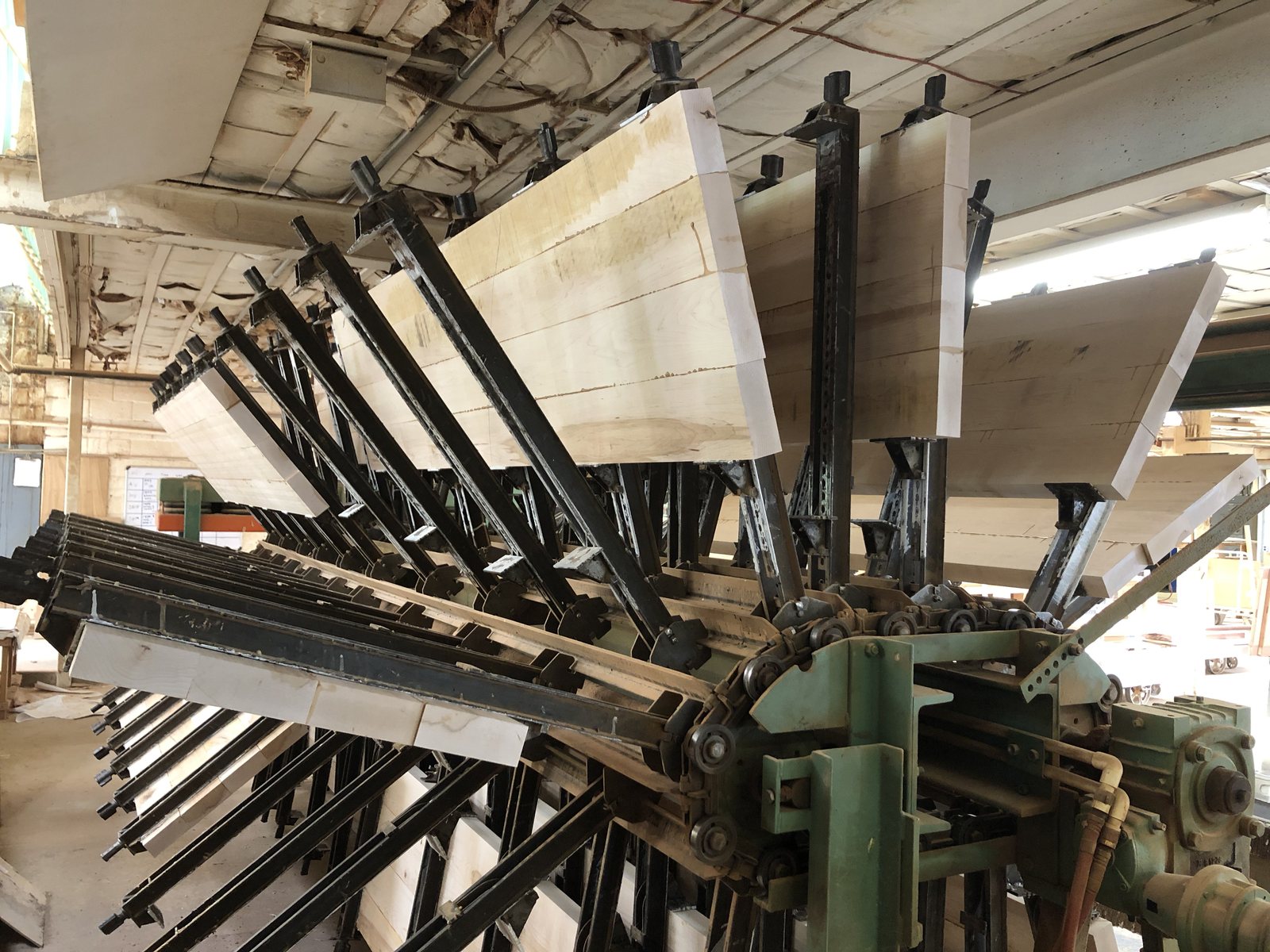Shelf and panel blanks glued up in clamps before they are cut to size