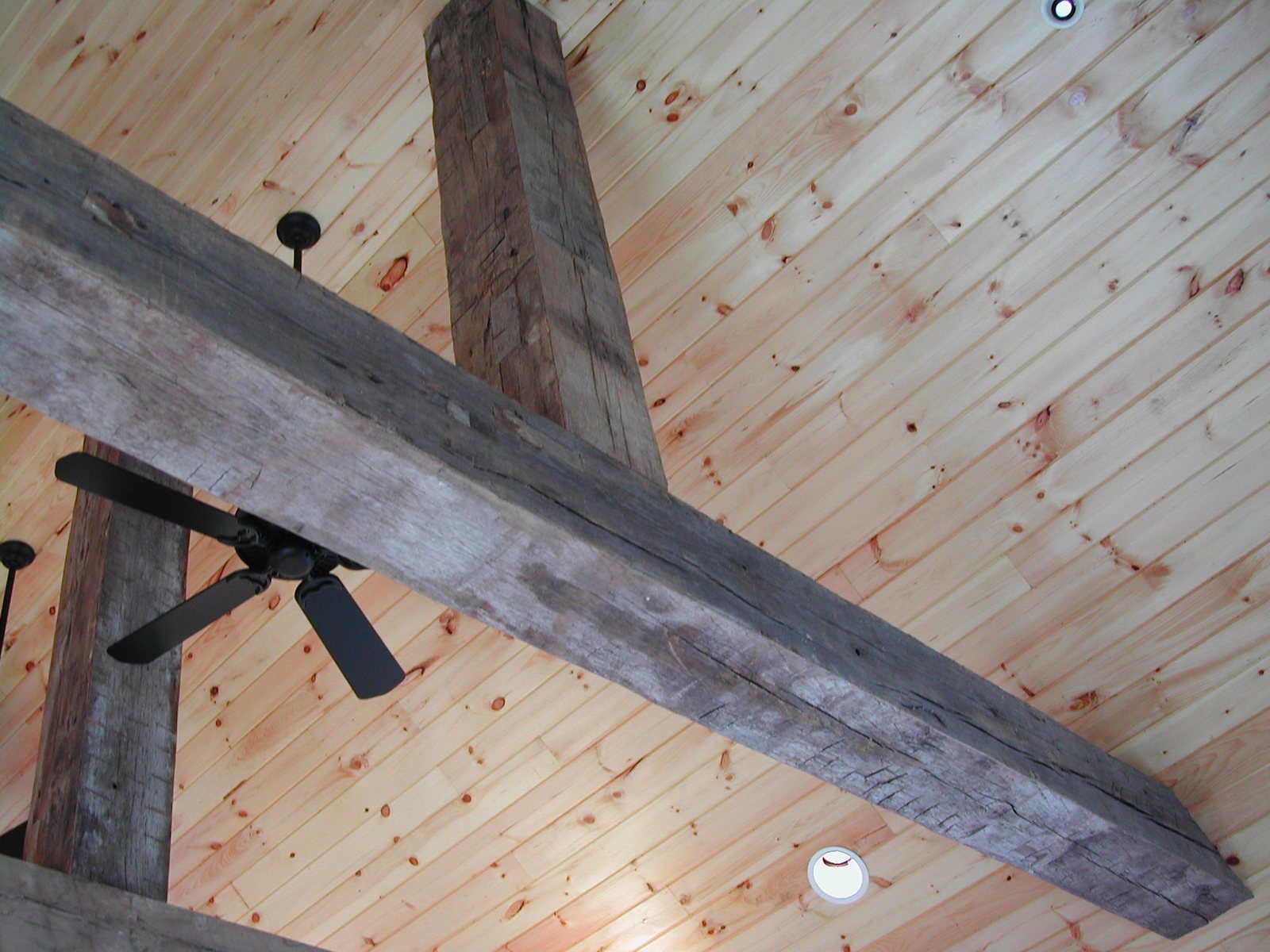 Hewn texture carried onto beams, where every piece has to match the retained sample