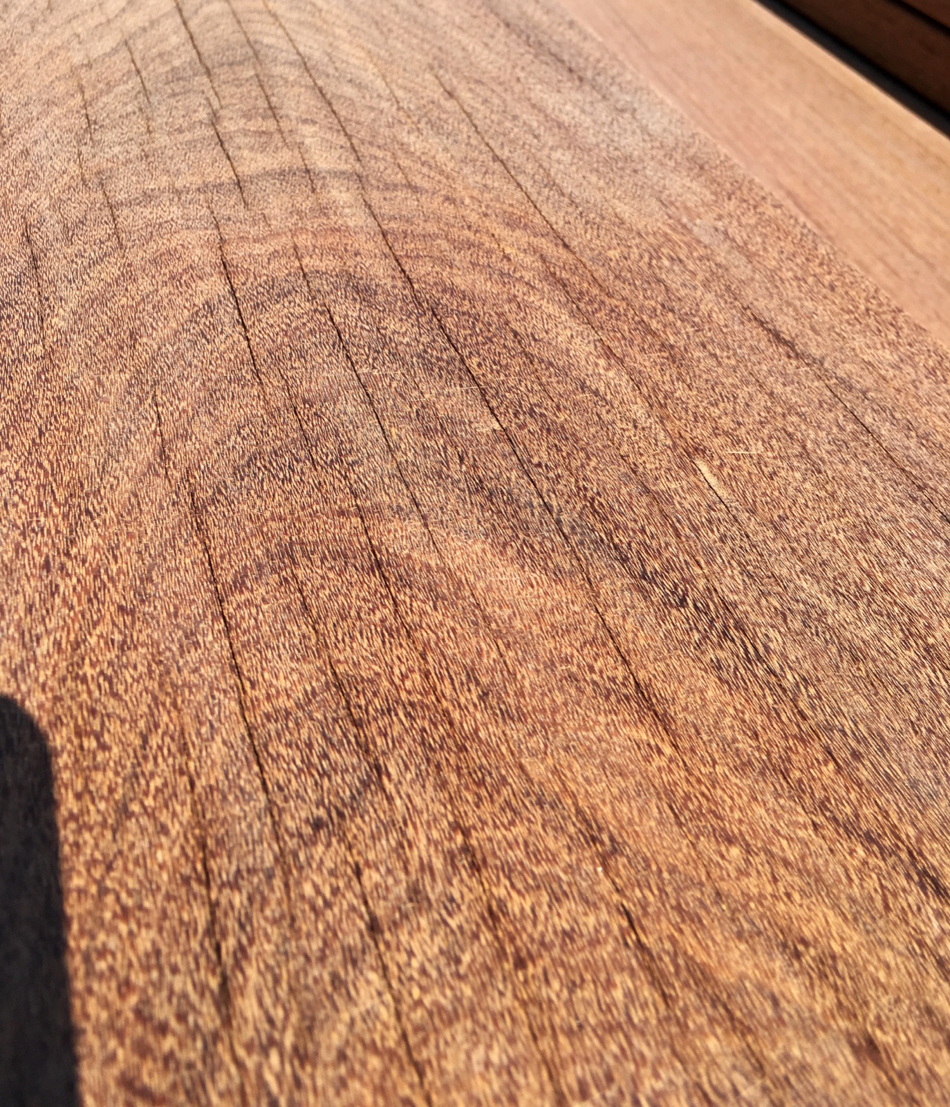 Surface Checks on a New Tropical Hardwood Deck and the First-Year Playbook That Keeps Them Hairline