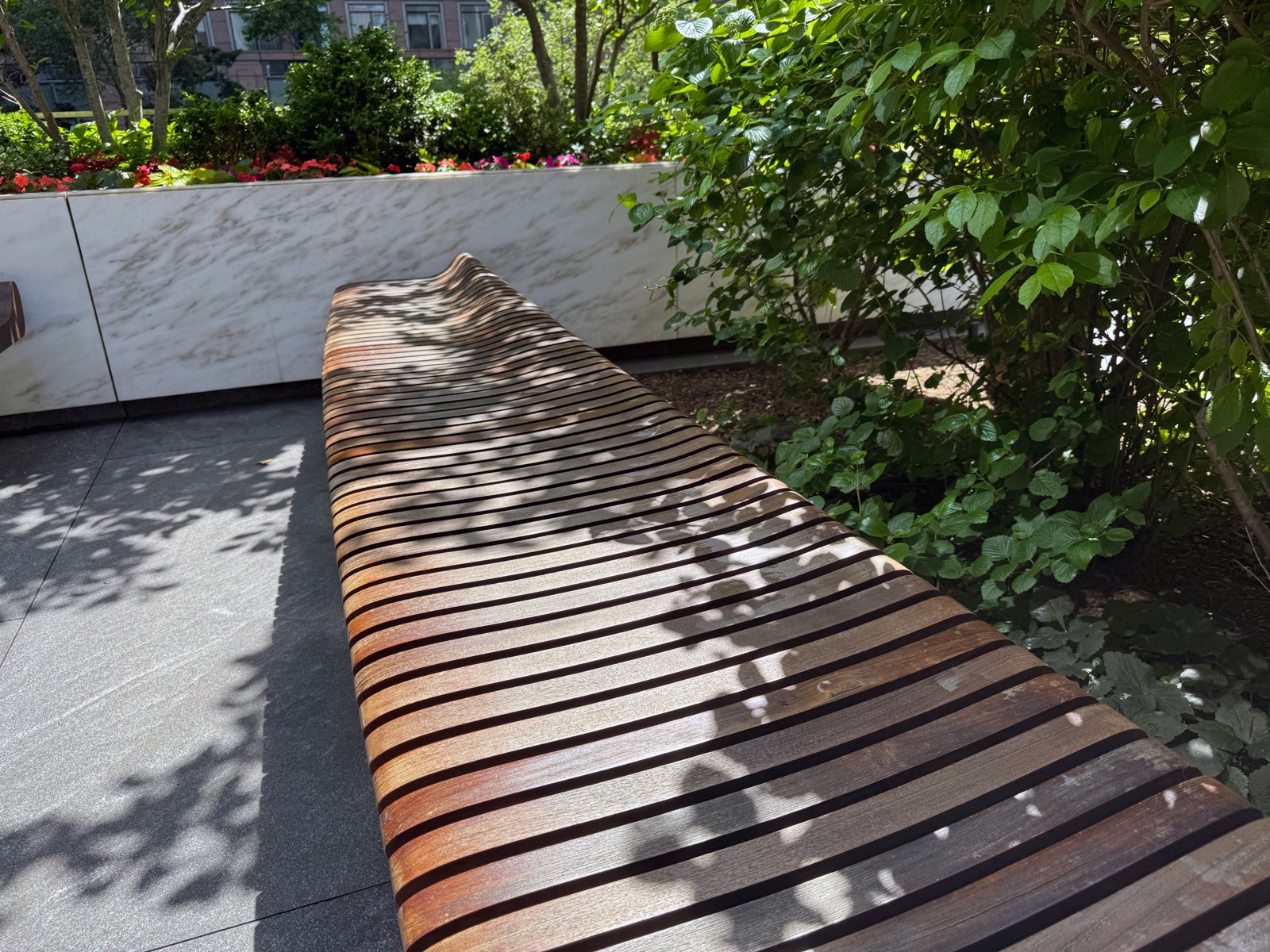 Slatted tropical hardwood public seating