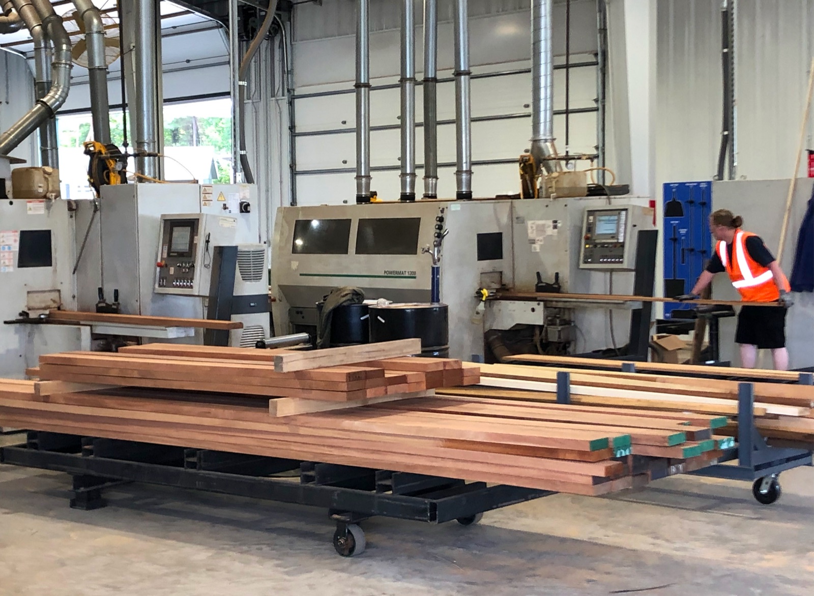 Molders running decking profiles at the mill