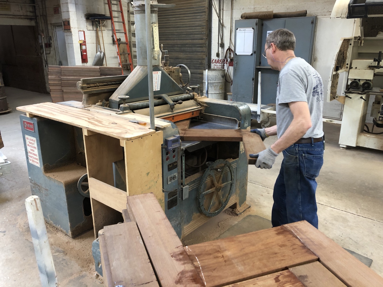 Tropical hardwood decking being planed to profile
