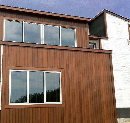 Utile cladding on a finished building elevation