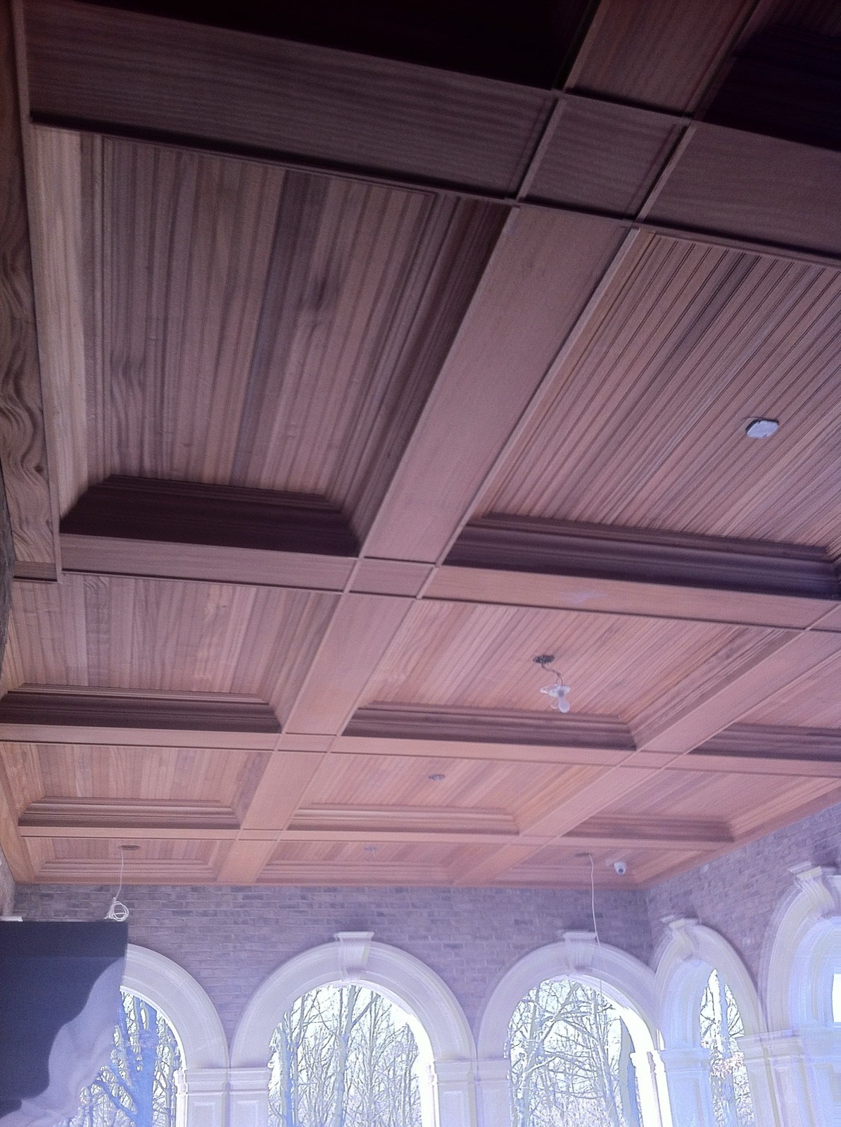 Coffered ceiling trimmed out with milled profiles