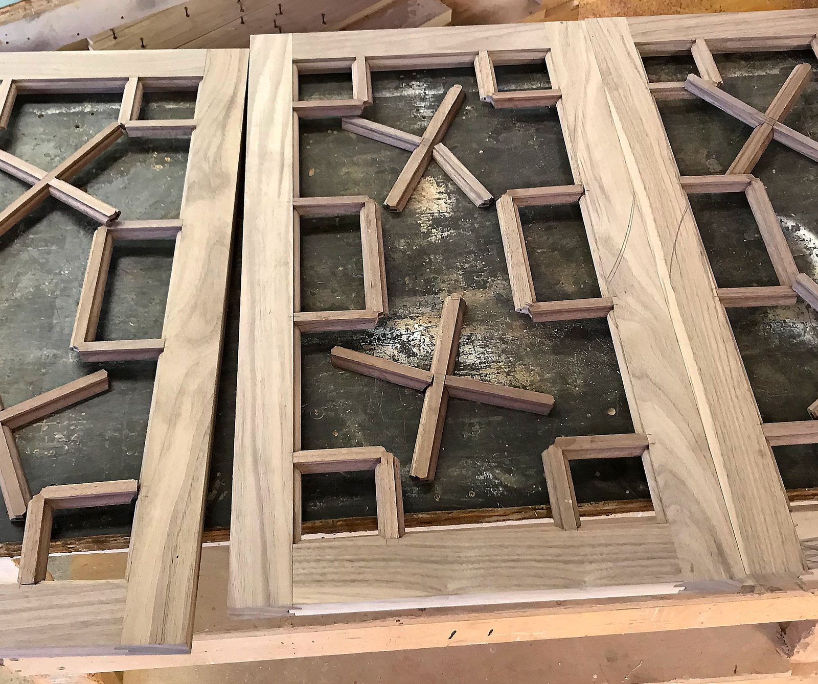 Muntin bar joinery at an angled intersection, showing how the profile runs through