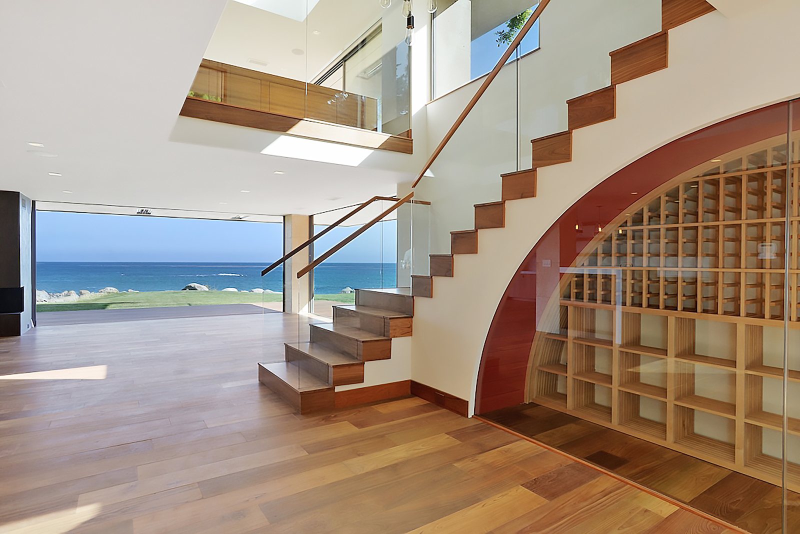 Teak treads and a slatted screen in the same stair