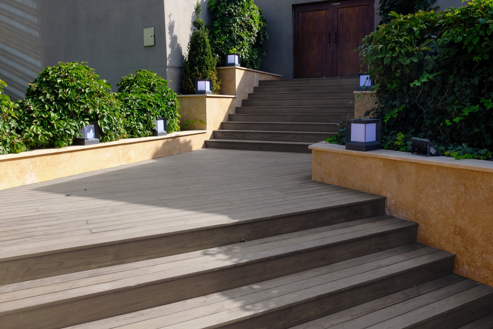 Tropical hardwood deck stairs on an exposed coastal site