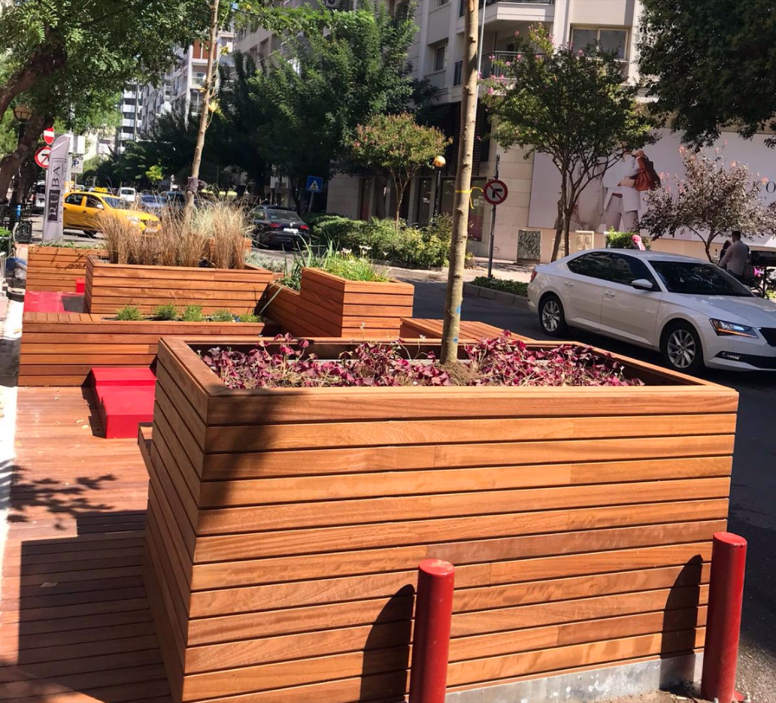 Thermally modified Ash planter boxes in an exterior setting