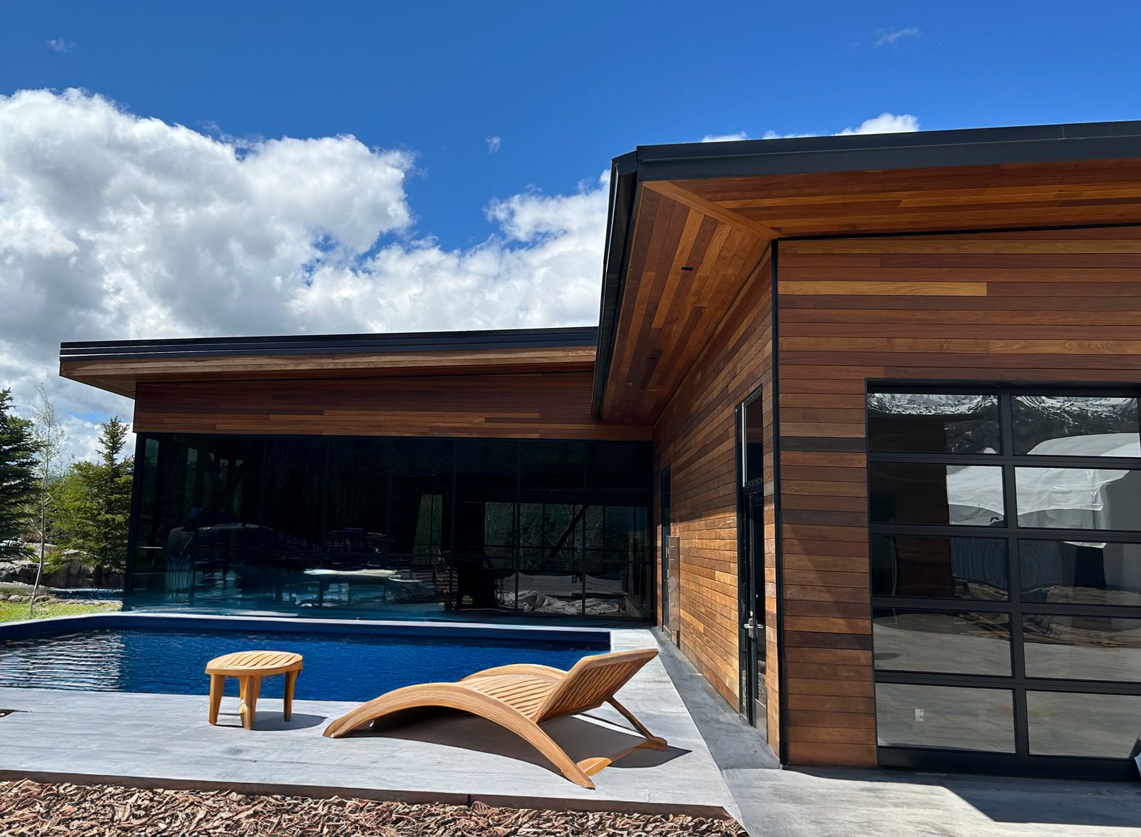 Ipe cladding running to the edge of a pool deck