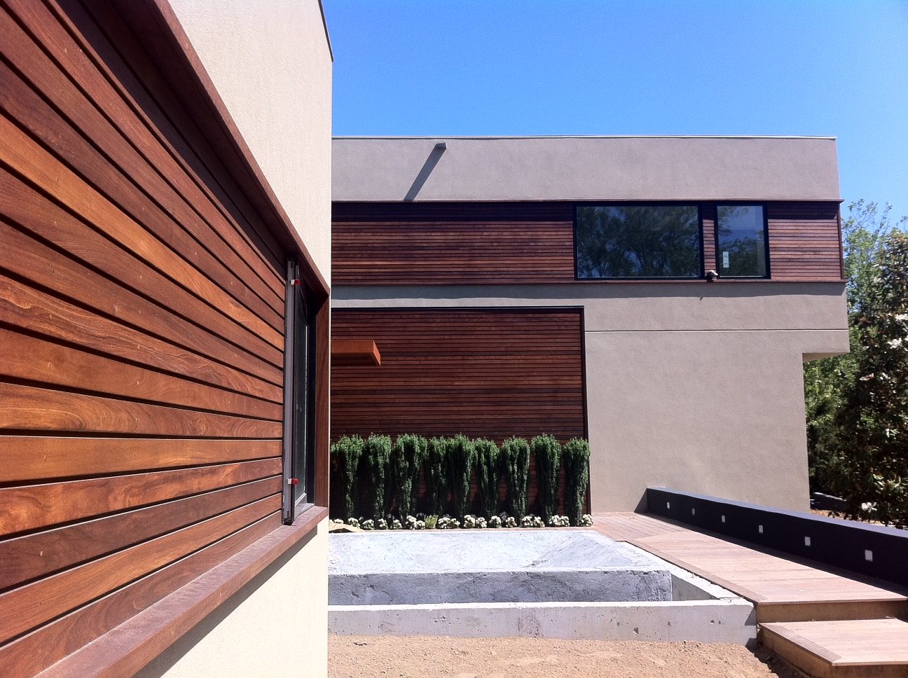 Deep eave and soffit over an Ipe clad elevation