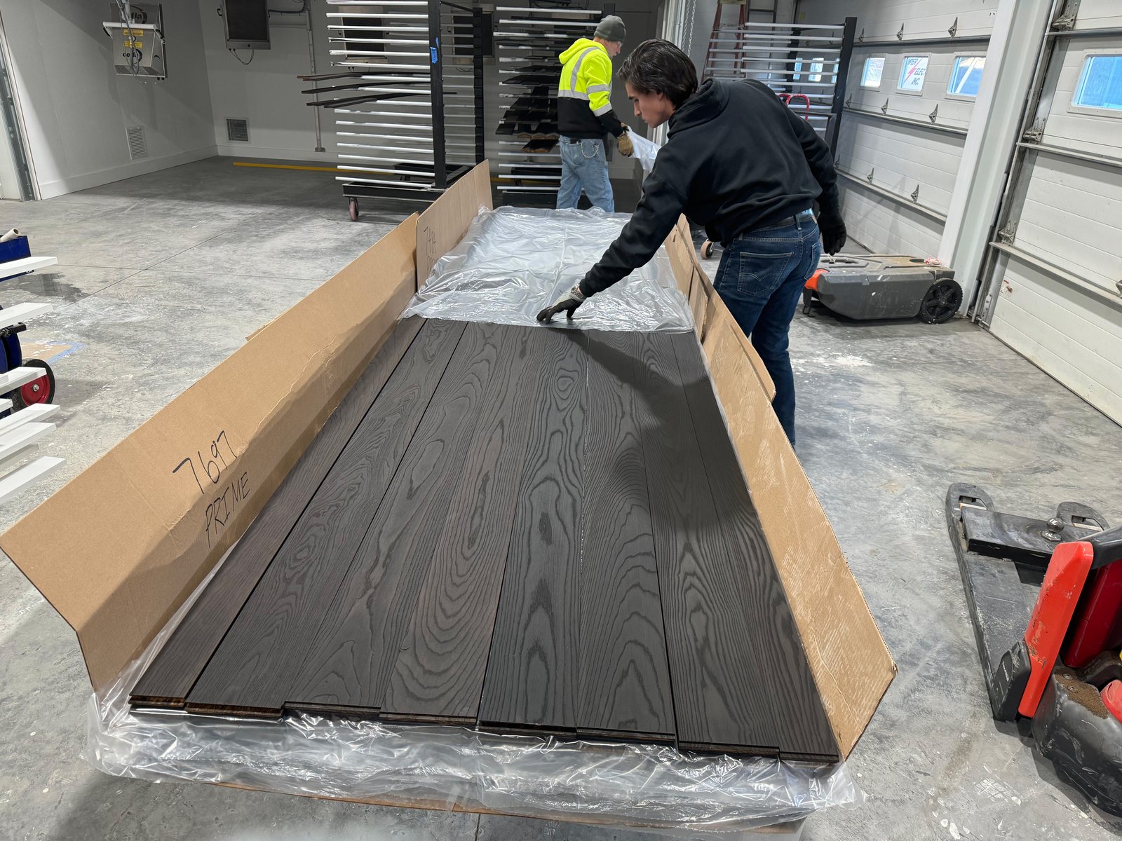 Boards being packed for shipment after the coating has cured