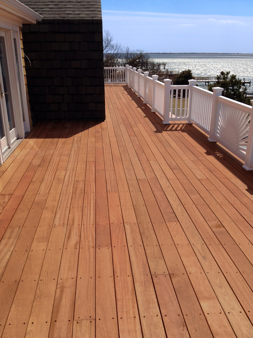 Covered tropical hardwood deck under steady foot traffic