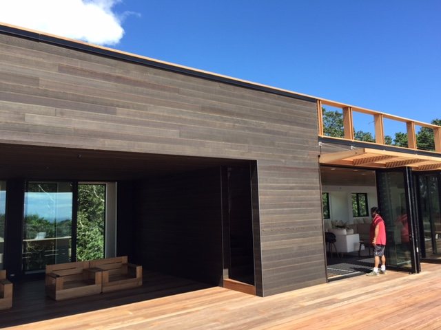 Weathered wood cladding on a finished building
