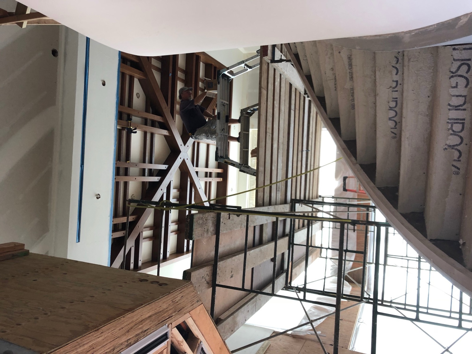 Beams carried across an open stair