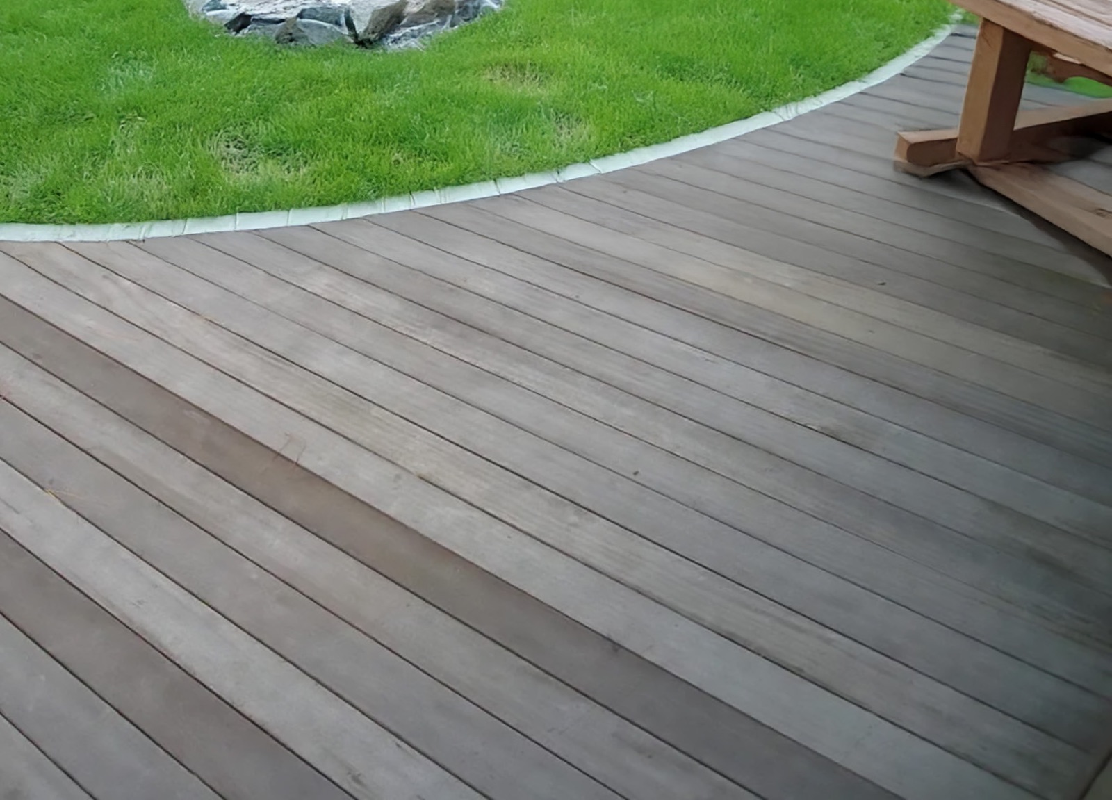 Tropical hardwood deck aged to an even silver gray