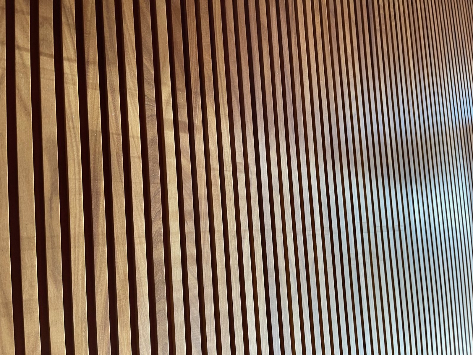 The same fluted run seen close, where the shadow in each valley reads as a line