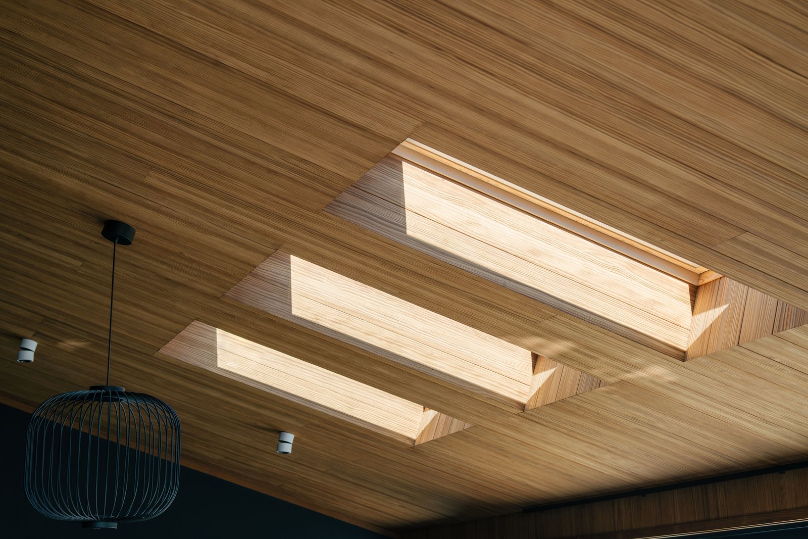 Modified ceiling in a straw tone seen from below