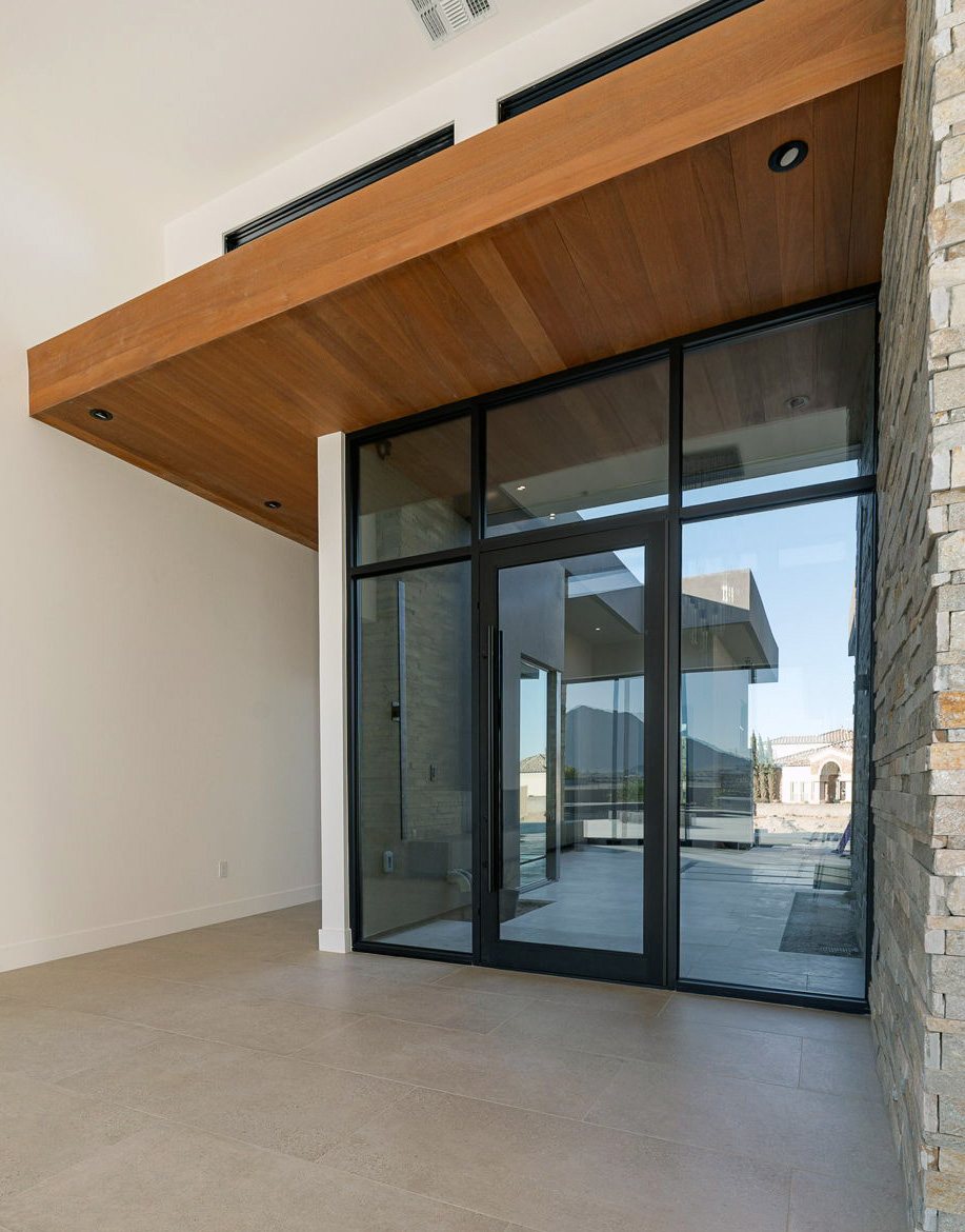 A ceiling that carries through the glass line and continues as an exterior soffit