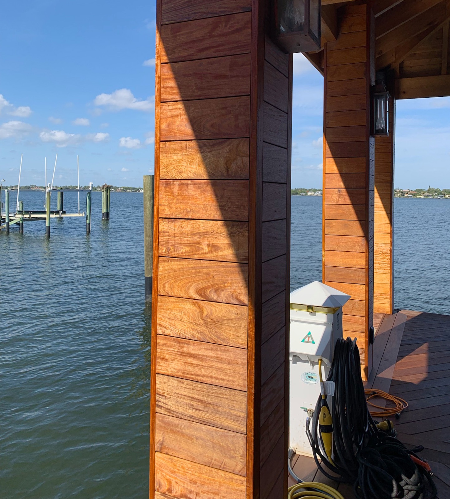 Tropical hardwood dock structure on a public waterfront