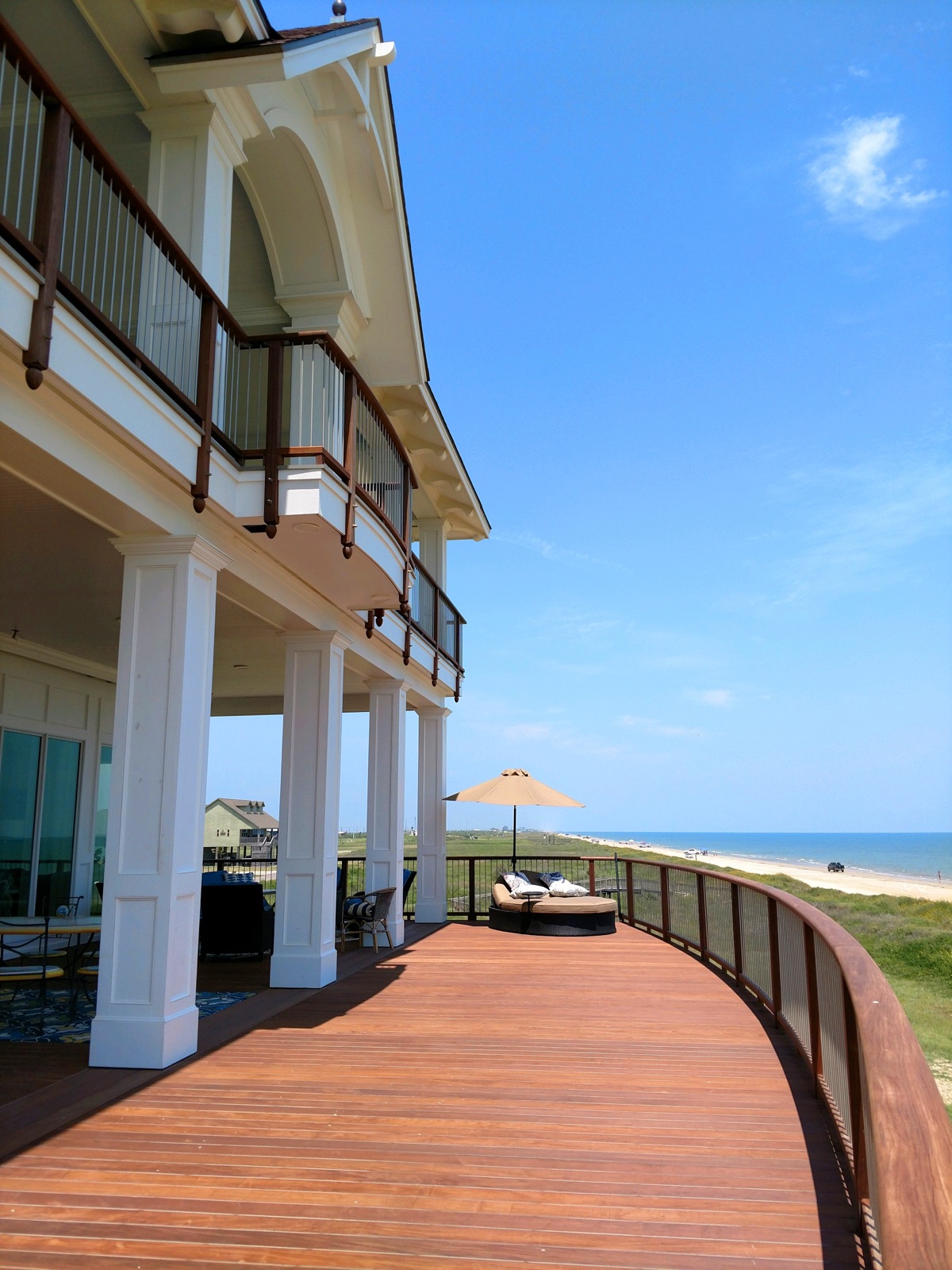Curved tropical hardwood deck walkway