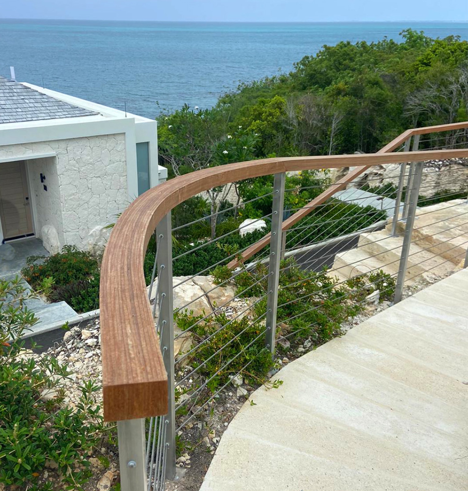 Bent tropical hardwood deck railing detail