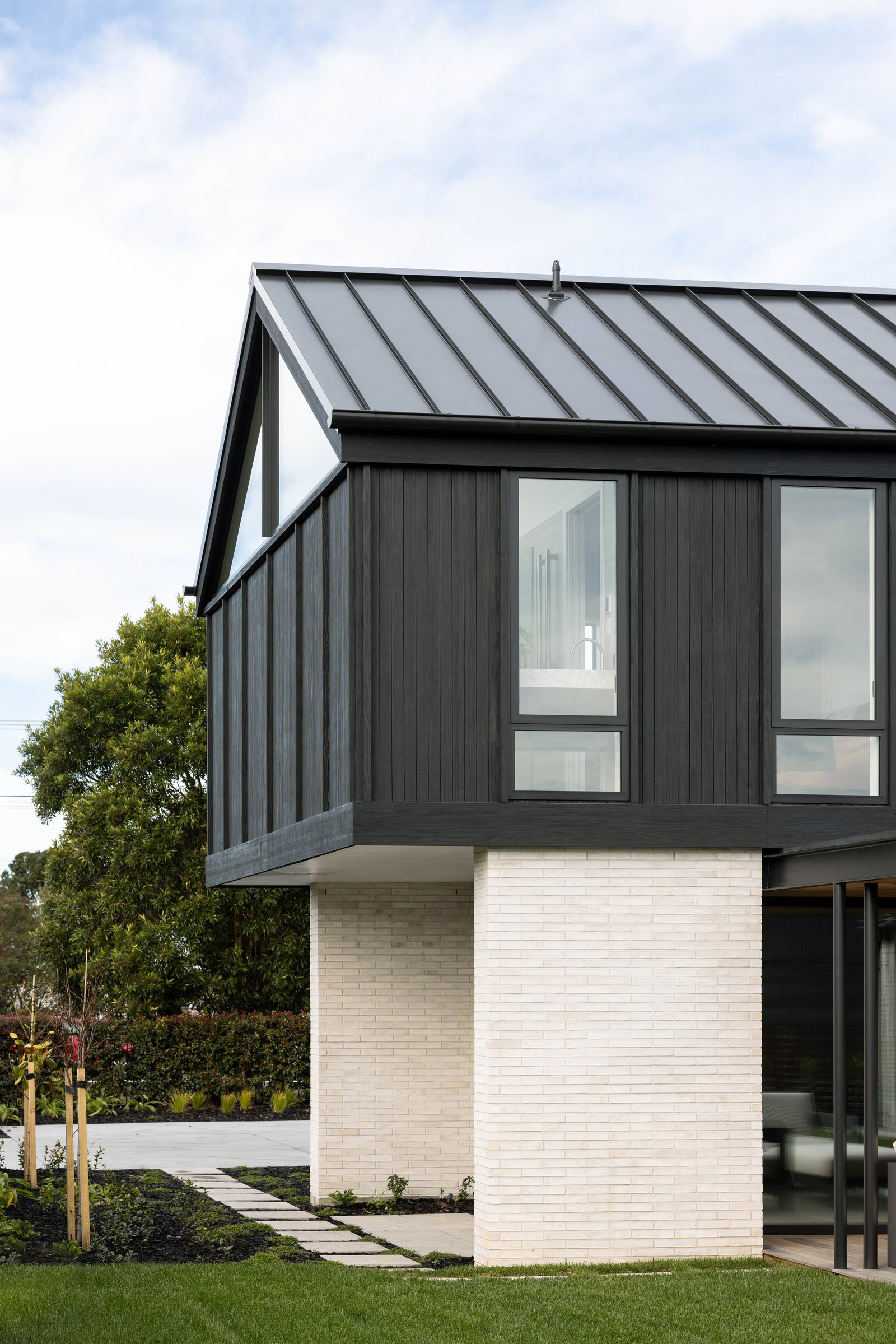 Thermally modified cladding in black on a gable elevation