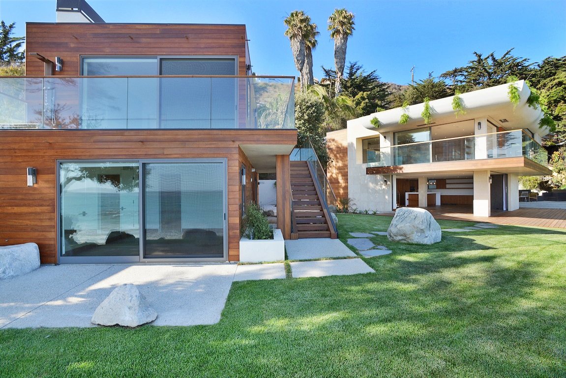 Teak siding on a coastal elevation in full sun