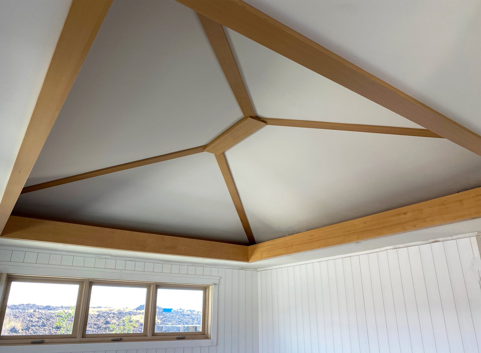 Beam ceiling framing a finished interior