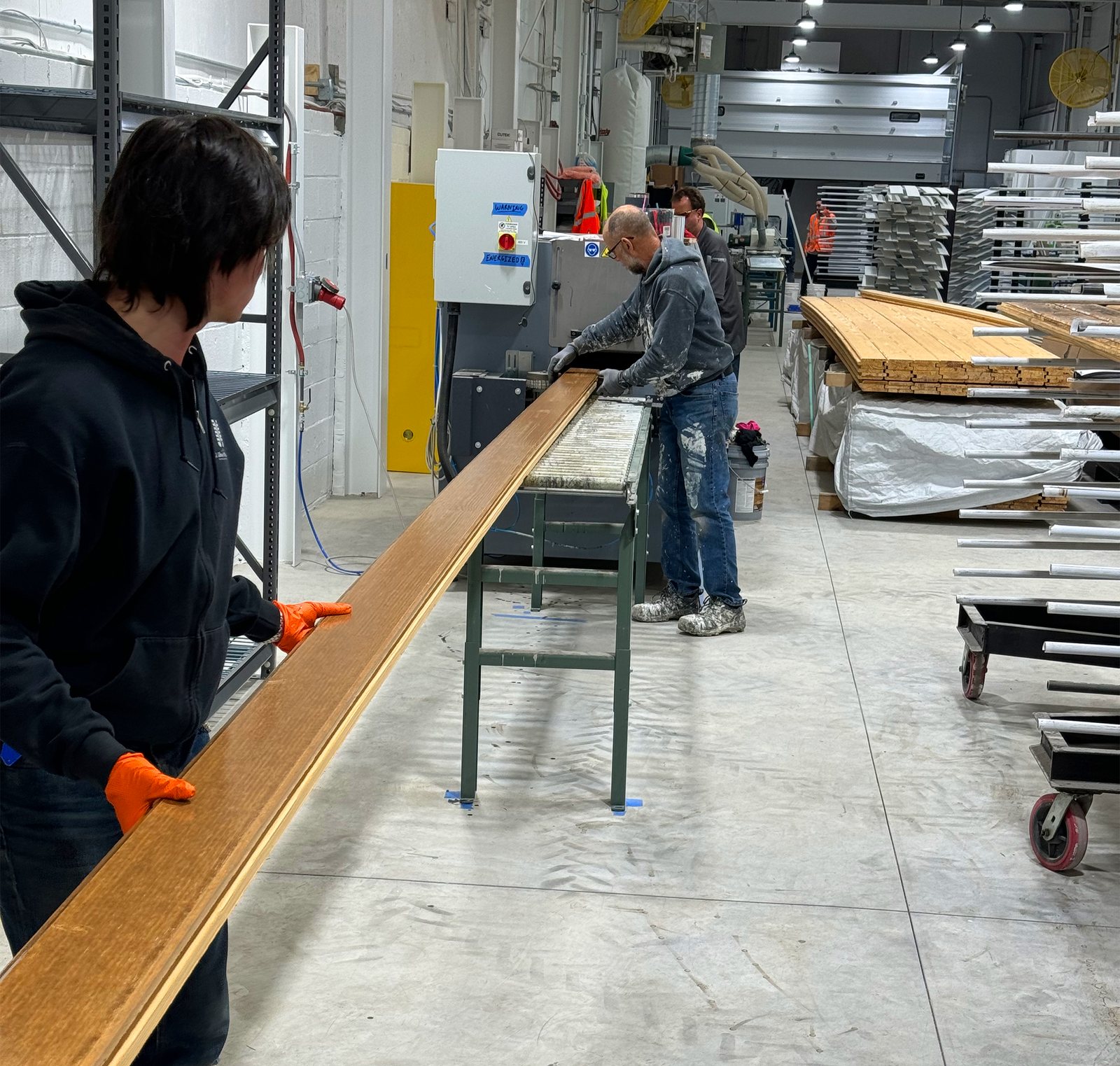 A board carried down the finishing line between coats