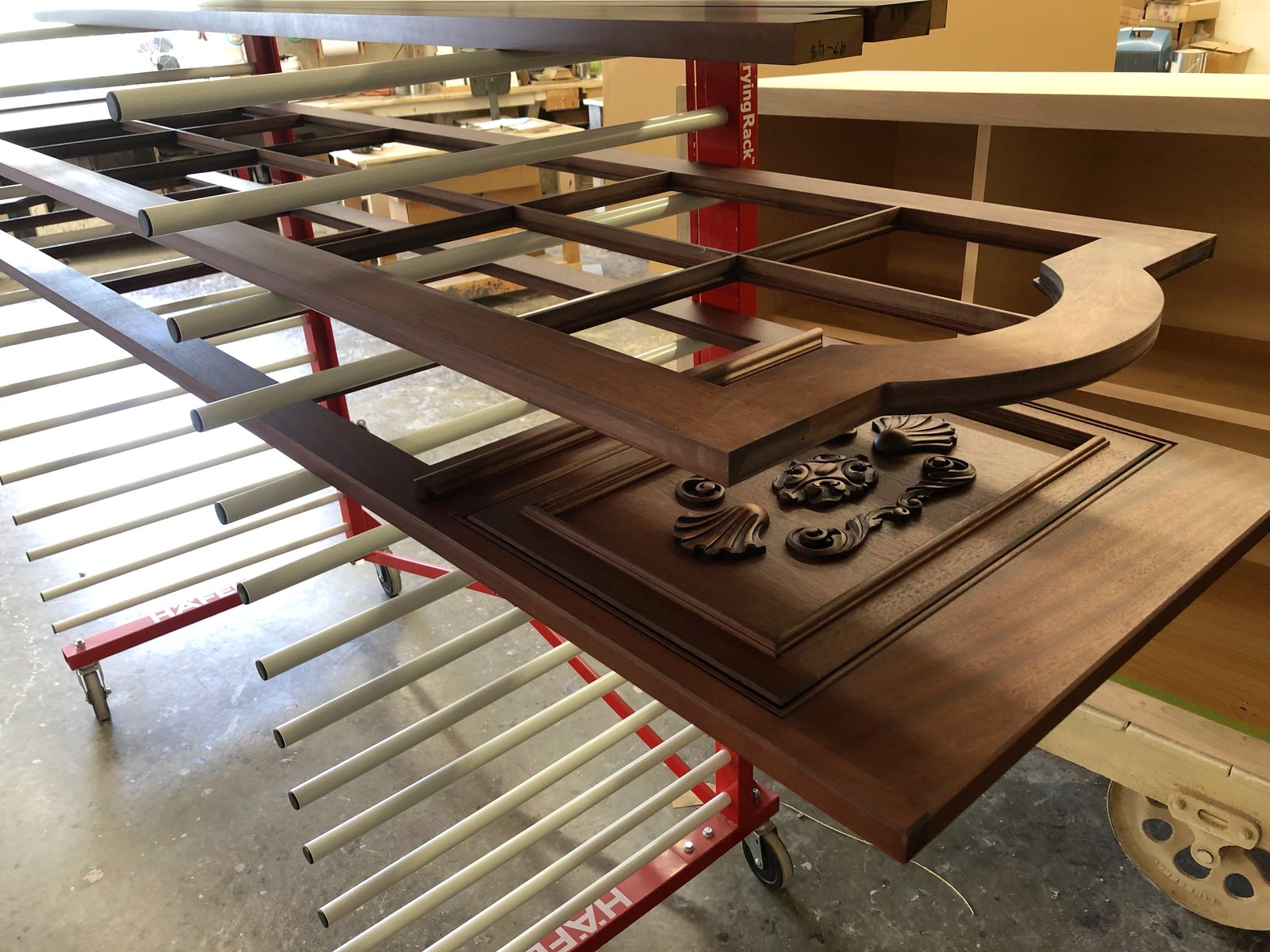 Doors on the finishing racks partway through the coating schedule