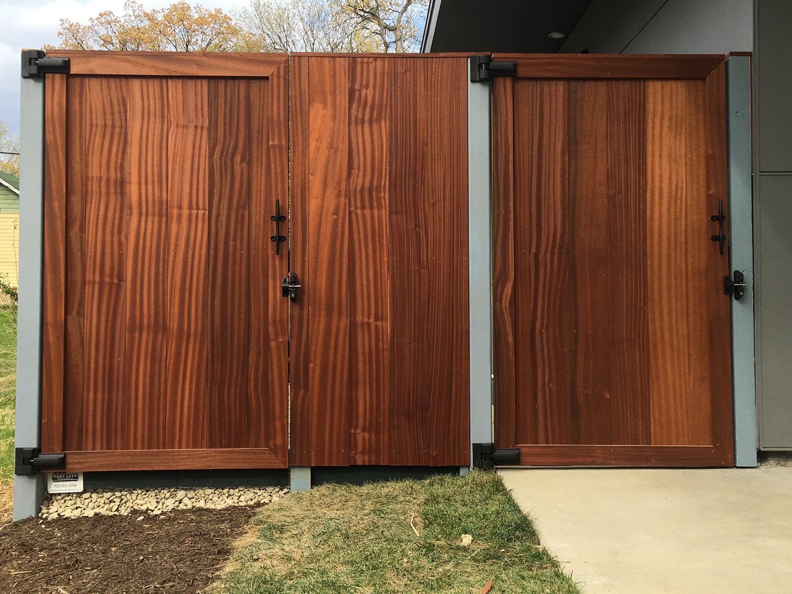 Mahogany swing gates, built the way a carriage door leaf is built