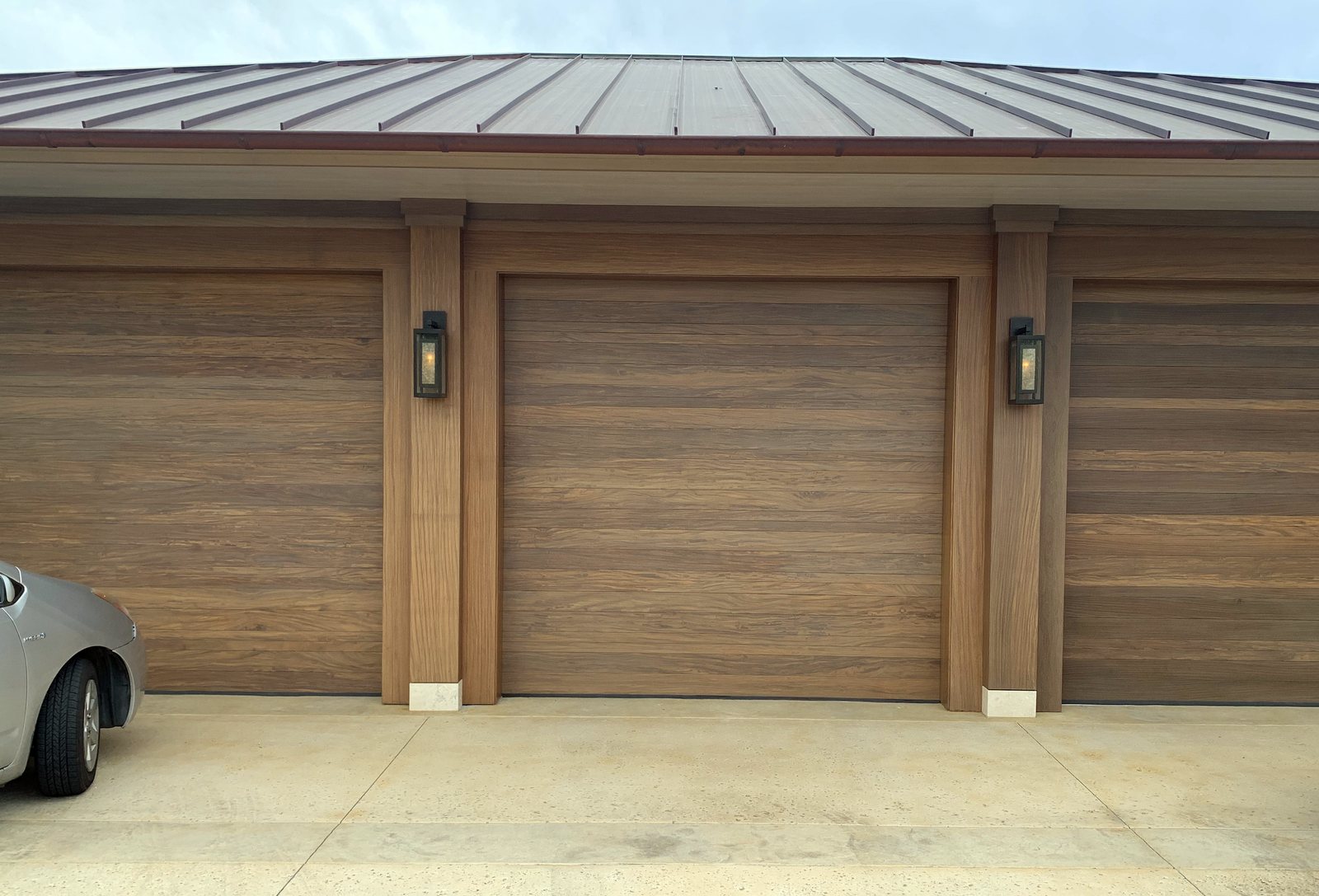 Wood Overlay on a Garage Door Opening, and Where the Millwork Scope Ends
